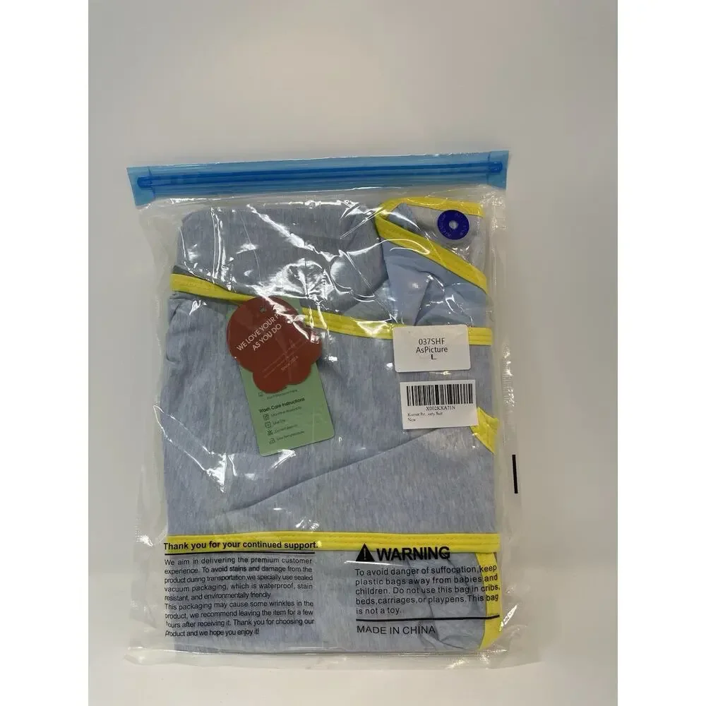 Kuoser recovery suit for dogs after surgery in light blue and‎ yellow.